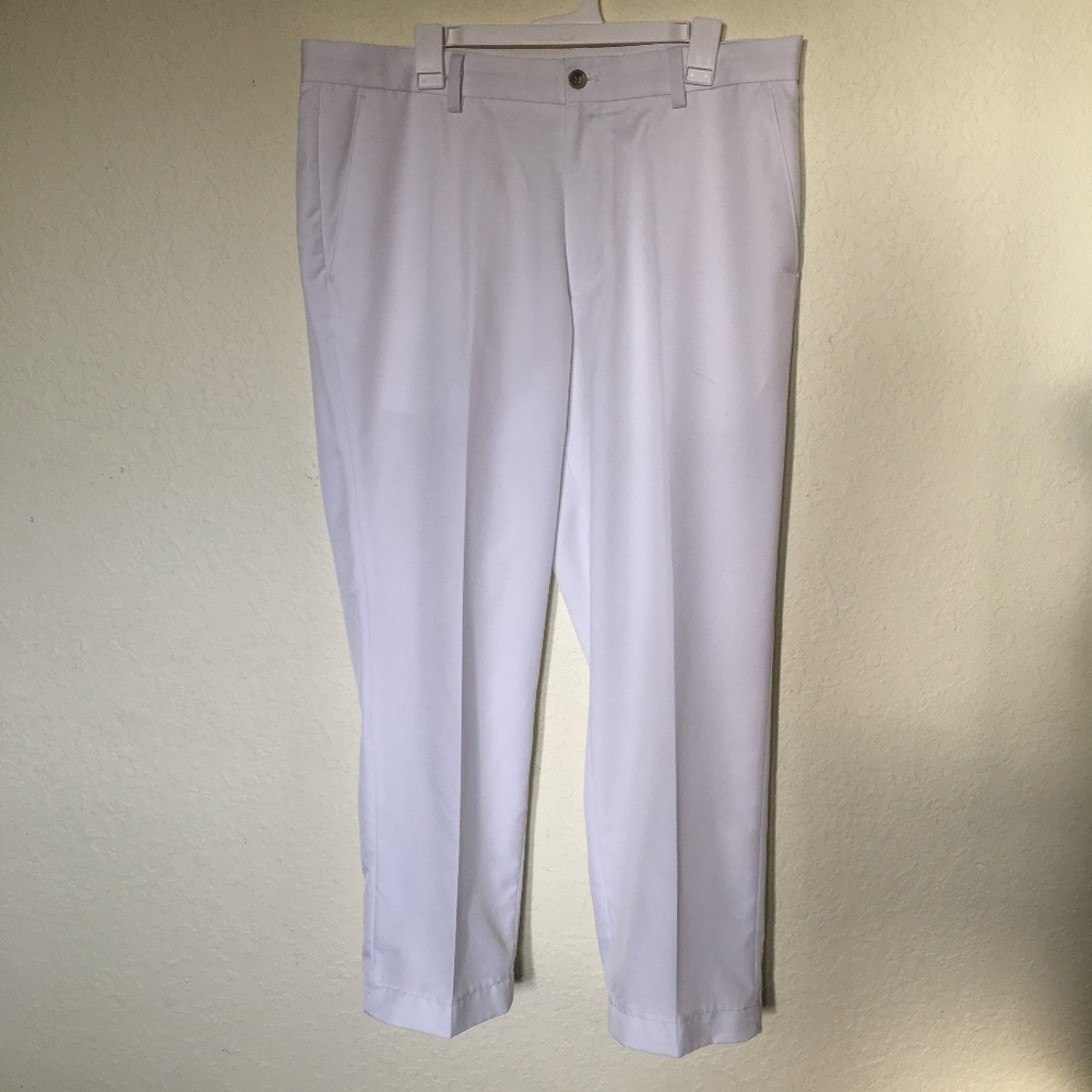 Greg Norman for Tasso Ella men's white golf pants. Size 36x30.